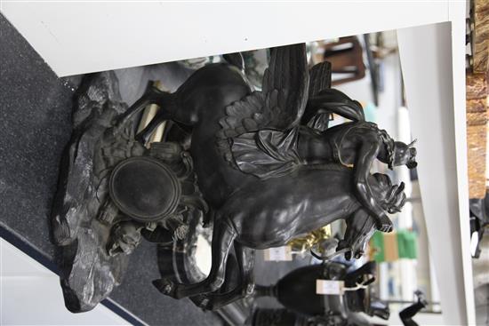 After Antoine Coysevox. A patinated bronze group of Mercury riding Pegasus, 24.5in.